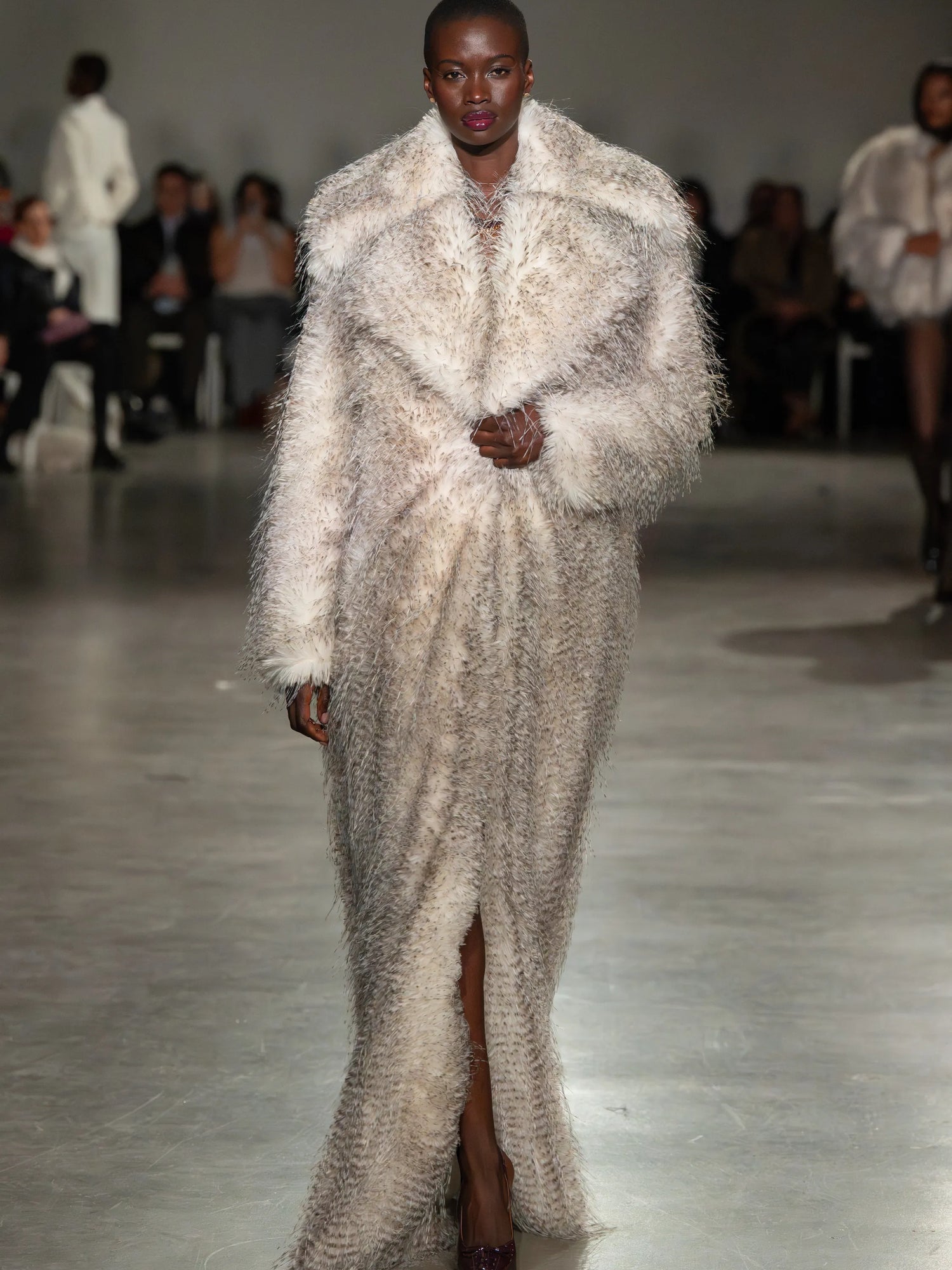 Long Line Feathered Faux Fur Coat